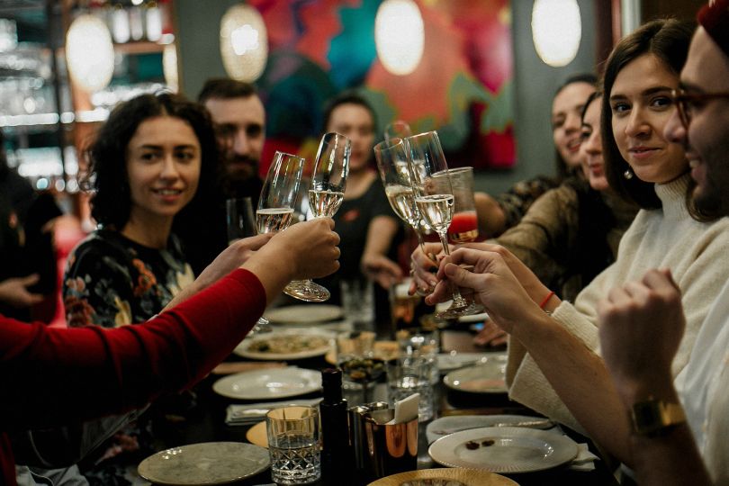 People drinking sparkling wine